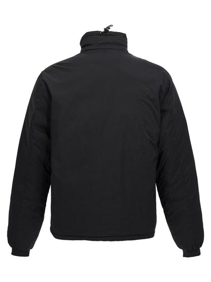 Windbreaker Jacket by Canada Goose for men in polyester nylon & goose-down black showcases a modern silhouette, integrating windproof, pockets & insulated and a modern asymmetric neckline for a sophisticated finish.