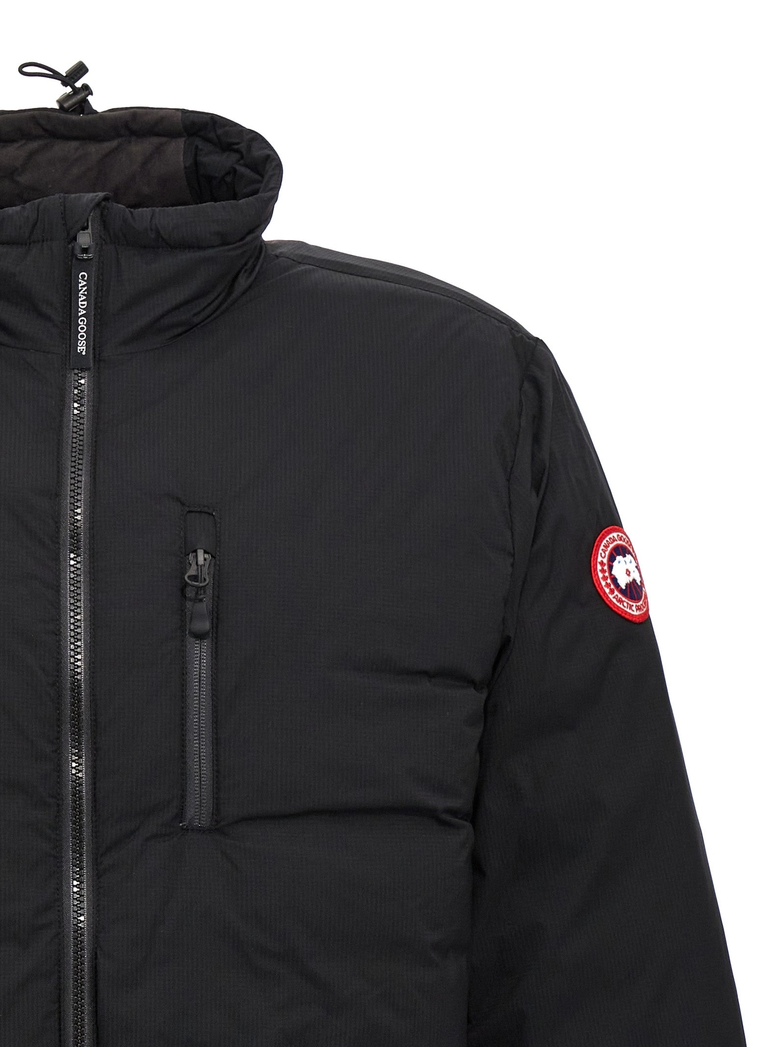 Windbreaker Jacket by Canada Goose for men in polyester nylon & goose-down black features an enduring silhouette, showcasing technical windproof, pockets & insulated and a sophisticated asymmetric neckline for a truly enduring aesthetic.
