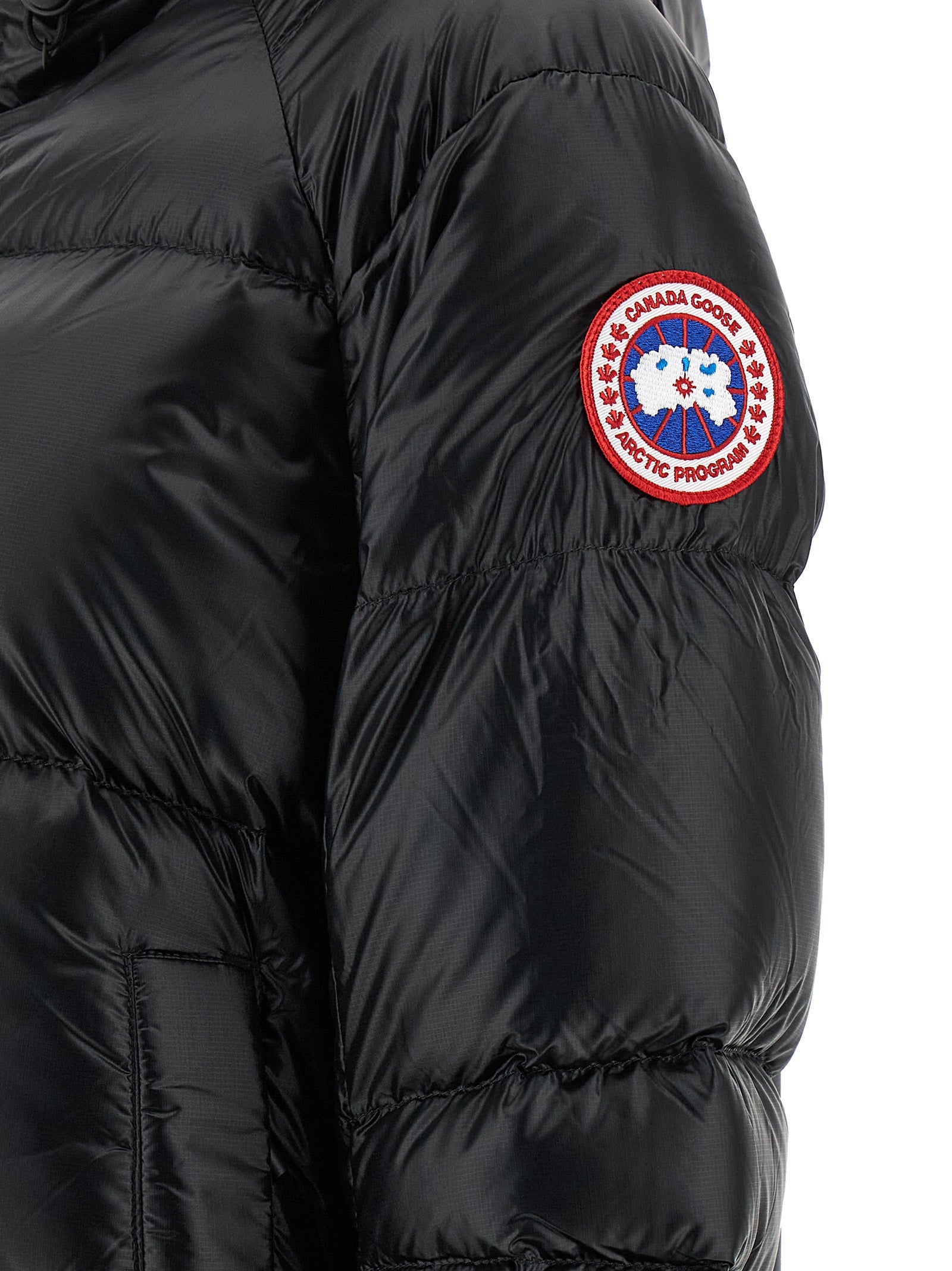 Hooded Overcoat by Canada Goose for women in polyamide black features a cosy chic silhouette, artfully detailed with a sophisticated and premium windproof & hooded for a cosy chic finish.