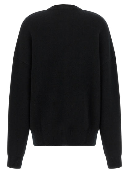 Cardigan by Extreme Cashmere for men in nylon & cashmere black & silver features a nuanced silhouette with a refined crew neckline and nuanced detailing for a sophisticated look.