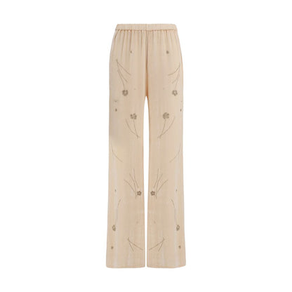 Trousers by Forte_Forte for women in polyamide viscose silk & crystal multicolor & floral features a artisanal silhouette, showcasing a sophisticated flared & regular-fit with a long and for a artisanal finish.