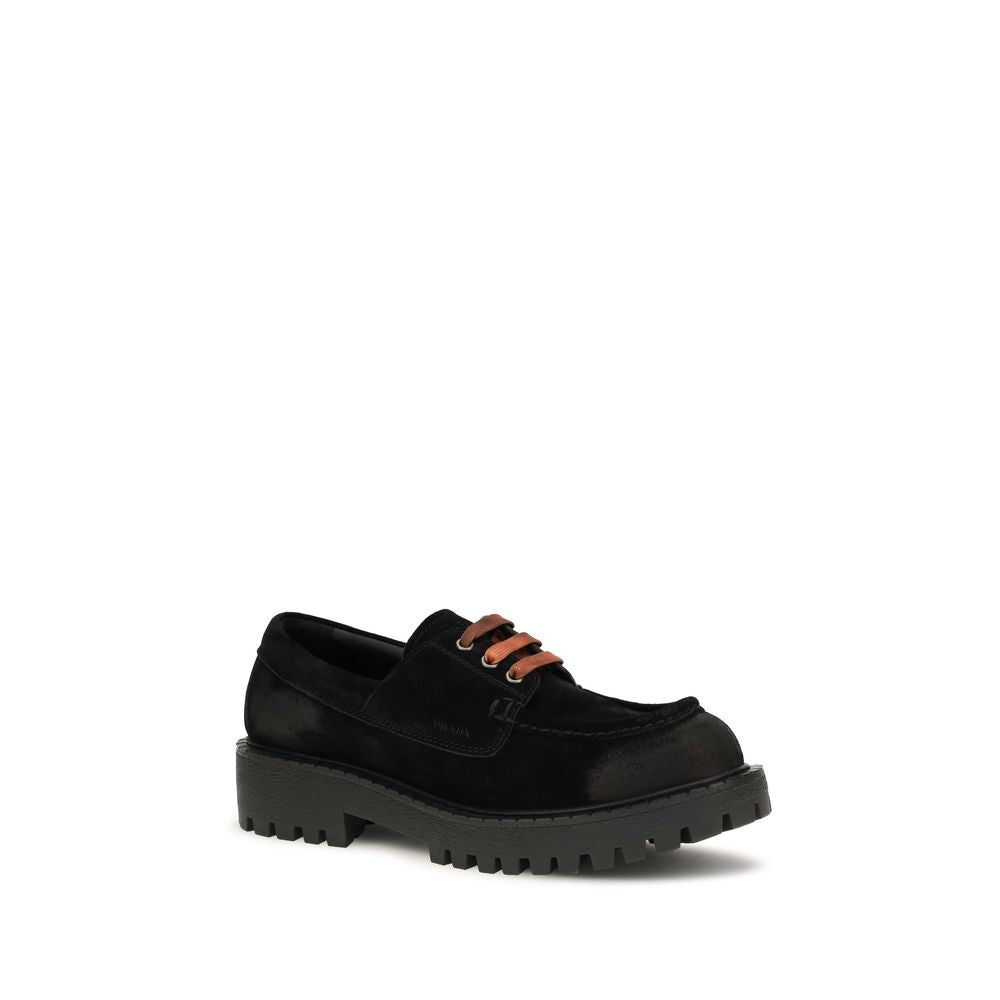 Loafer Slip-On Lace-Up Shoes by Prada for men in suede leather & rubber black features an dynamic silhouette from the Men's Suede Leather & Rubber Loafer Slip-On Lace-Up Shoes collection, defined by a dynamic and for a dynamic look.