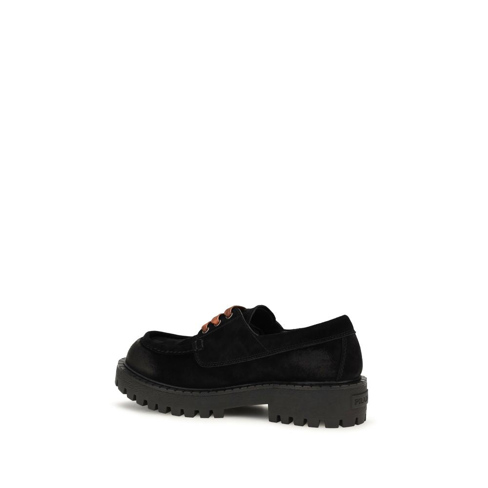 Loafer Slip-On Lace-Up Shoes by Prada for men in suede leather & rubber black showcases a resplendent Men's Suede Leather & Rubber Loafer Slip-On Lace-Up Shoes aesthetic, defined by its resplendent and elegant .