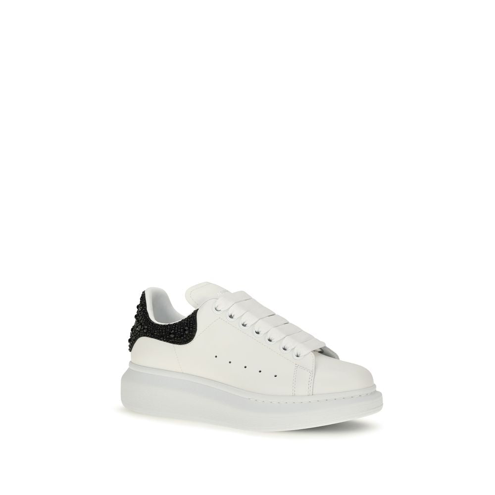 Sneakers by Alexander McQueen for women in bos taurus suede calf leather black, white & signature features an fashionable silhouette, showcasing the premium Women's Chunky Bos Taurus Suede Calf Leather Sneakers in a fashionable chunky style that offers a fashionable finish for refined style.