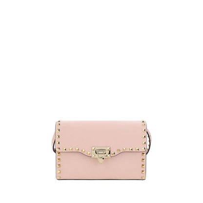 Small Shoulder Bag by Valentino Garavani for women in bos taurus calf leather pink presents a versatile silhouette, showcasing a secure and versatile with versatile shoulder-strap for a sophisticated look.