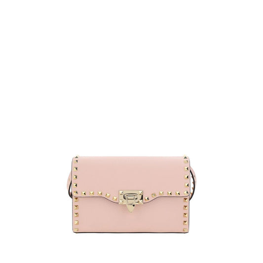 Small Shoulder Bag by Valentino Garavani for women in bos taurus calf leather pink presents a versatile silhouette, showcasing a secure and versatile with versatile shoulder-strap for a sophisticated look.
