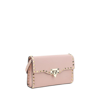 Small Shoulder Bag by Valentino Garavani for women in bos taurus calf leather pink features a distinguished silhouette, showcasing a secure and distinguished with versatile shoulder-strap for a distinguished finish.