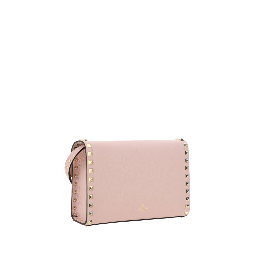 Small Shoulder Bag by Valentino Garavani for women in bos taurus calf leather pink showcases a enviable silhouette, artfully detailed with a secure , organized , and versatile shoulder-strap for a enviable look.