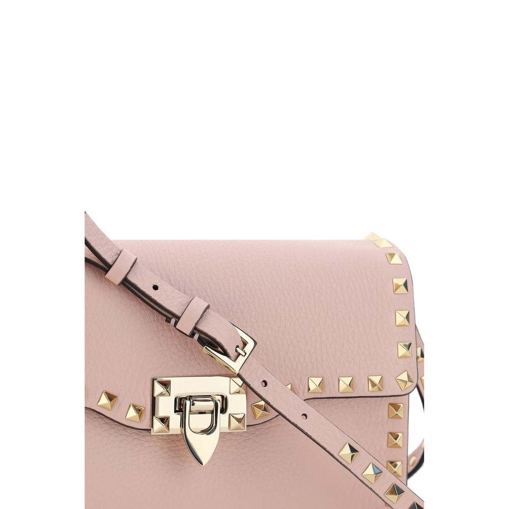 Small Shoulder Bag by Valentino Garavani for women in bos taurus calf leather pink features a effortless sophistication silhouette, secured by a with ample and versatile shoulder-strap for a effortless sophistication finish.