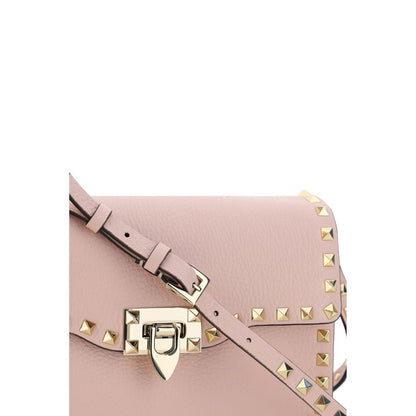 Small Shoulder Bag by Valentino Garavani for women in bos taurus calf leather pink features a effortless sophistication silhouette, secured by a with ample and versatile shoulder-strap for a effortless sophistication finish.