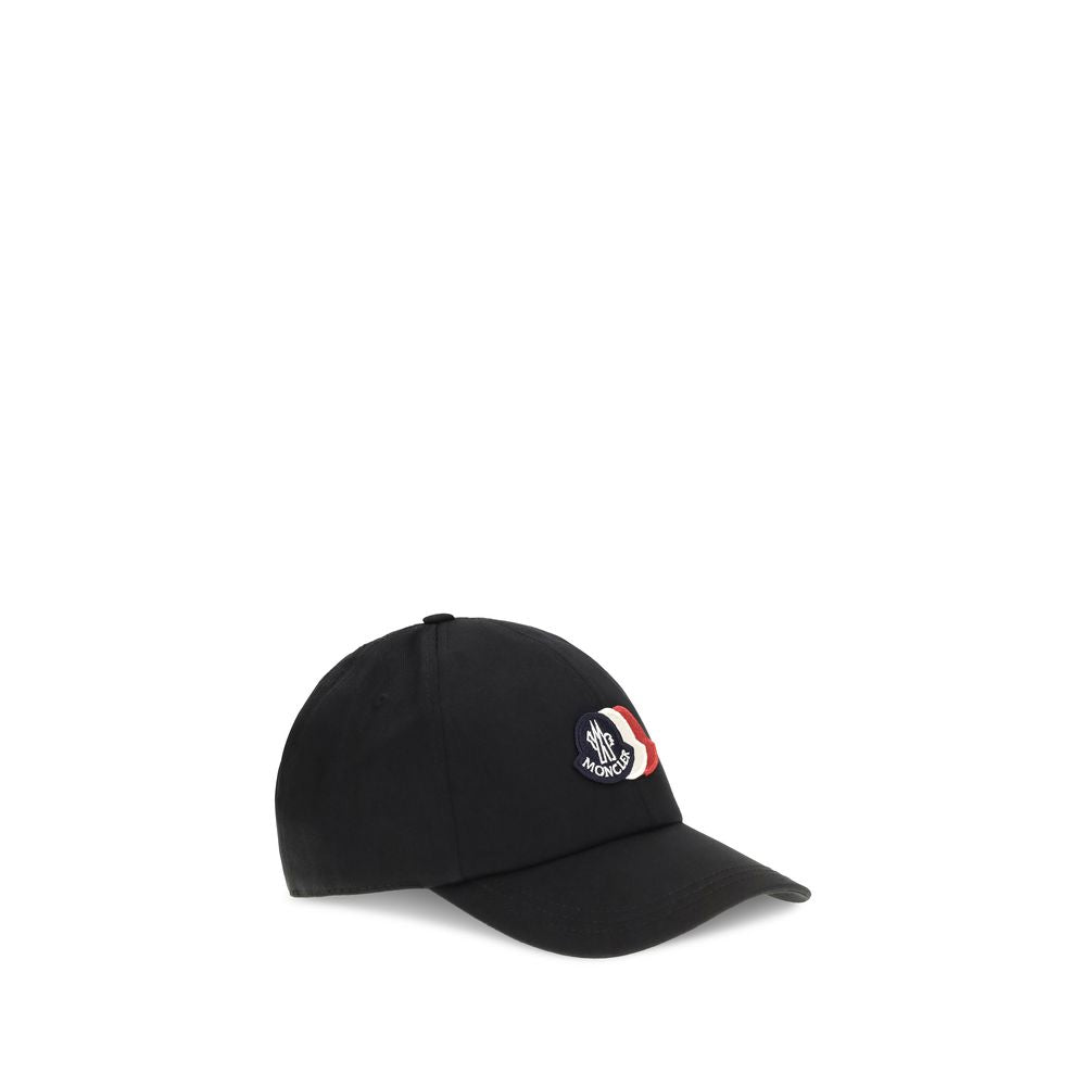 Baseball Cap by Moncler for men in cotton black presents a statuesque silhouette, artfully capturing the essence of the statuesque Cotton Baseball Cap design for a sophisticated look.