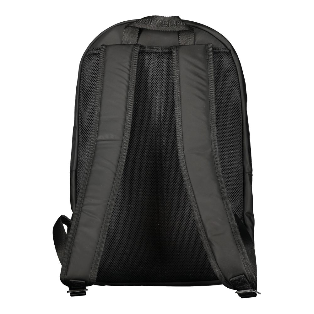 Backpack by Tommy Hilfiger for men in polyester black showcases a stately Polyester Backpack design, featuring a secure zipper with stately external-pockets, internal-pockets & laptop-compartment and versatile backpack-strap, adjustable-strap & handle.