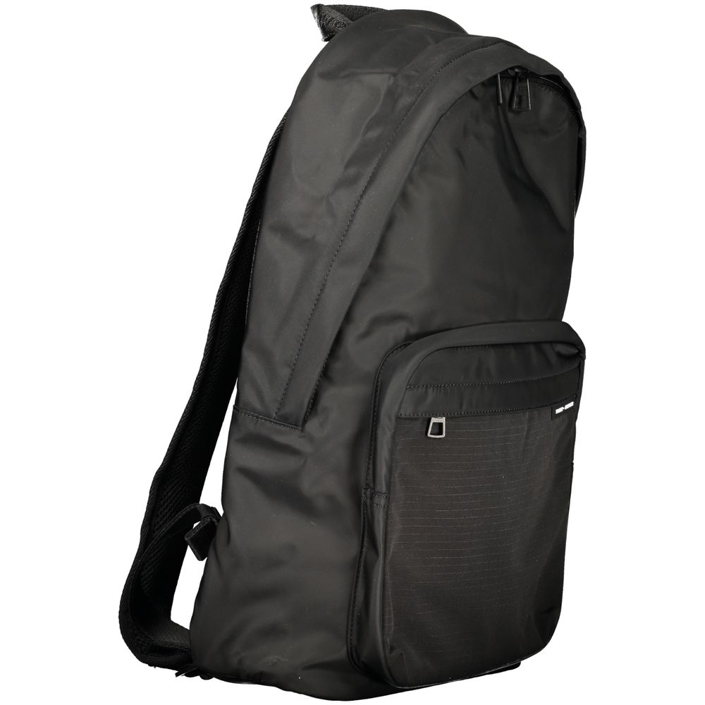 Backpack by Tommy Hilfiger for men in polyester black features a architectural Polyester Backpack design with a secure zipper, ample external-pockets, internal-pockets & laptop-compartment, and versatile backpack-strap, adjustable-strap & handle for a architectural finish.