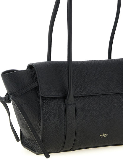 Small Shoulder Flap Bag by Mulberry for women in calfskin leather black & gold showcases a enviable silhouette, artfully detailed with a secure flap, organized , and versatile shoulder-strap, adjustable-strap & handle for a enviable look.