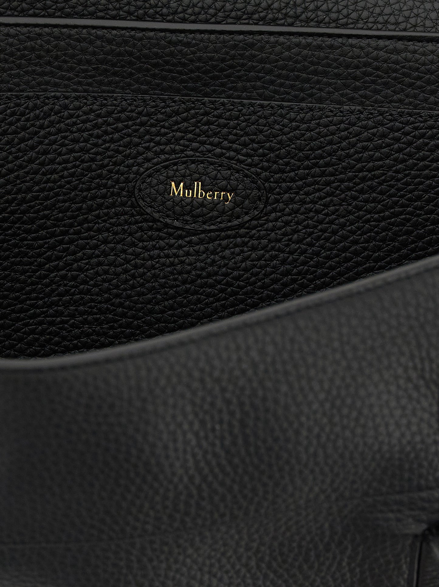 Small Shoulder Flap Bag by Mulberry for women in calfskin leather black & gold features an effortlessly chic silhouette with a secure flap, ample , and versatile shoulder-strap, adjustable-strap & handle for effortlessly chic everyday luxury.