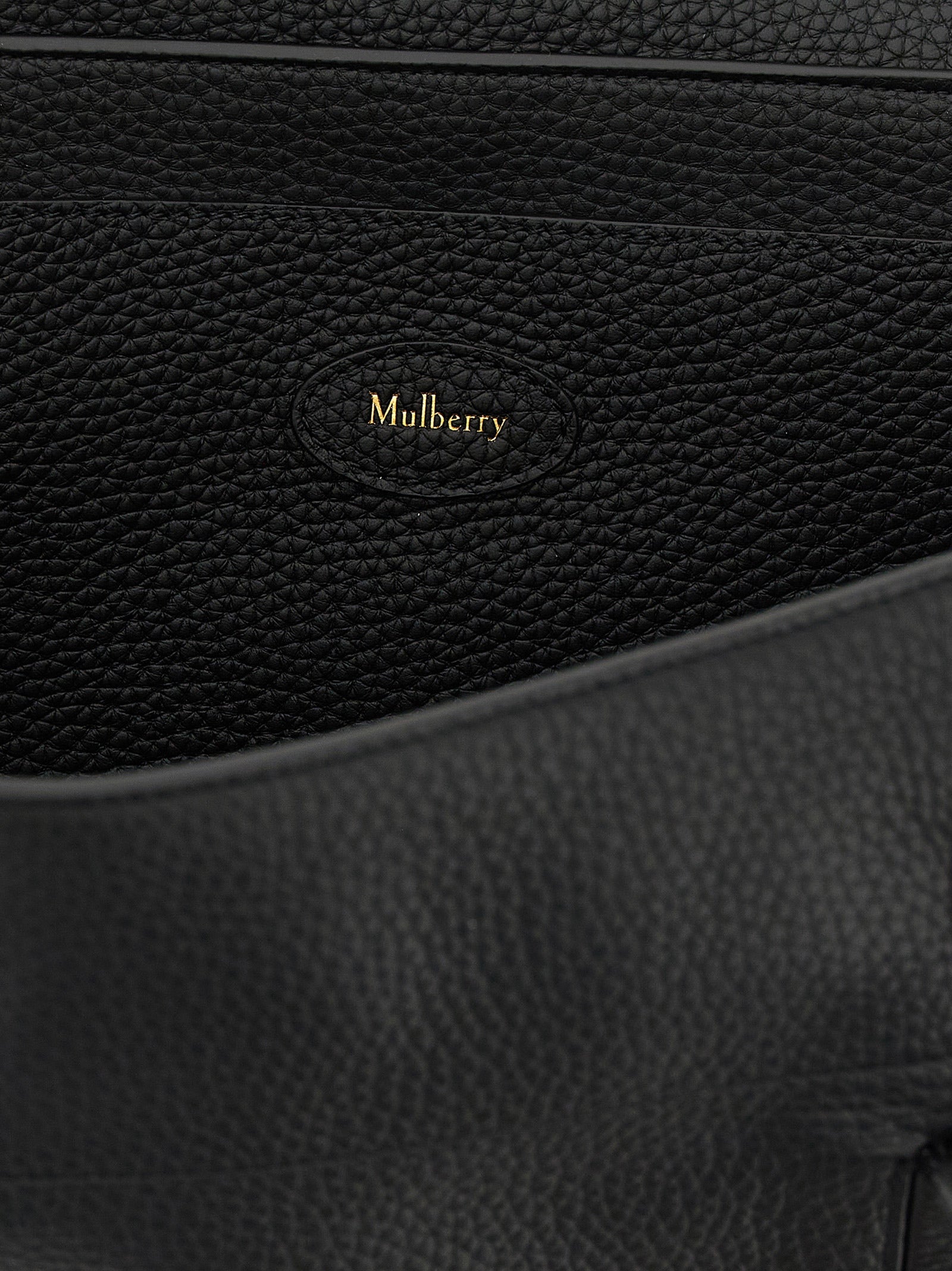 Small Shoulder Flap Bag by Mulberry for women in calfskin leather black & gold features an effortlessly chic silhouette with a secure flap, ample , and versatile shoulder-strap, adjustable-strap & handle for effortlessly chic everyday luxury.
