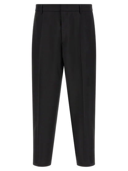 Trousers by Jil Sander for men in mohair & virgin wool black features a sculptural silhouette, showcasing a sculptural cropped and cropped with a sophisticated for a sculptural finish.