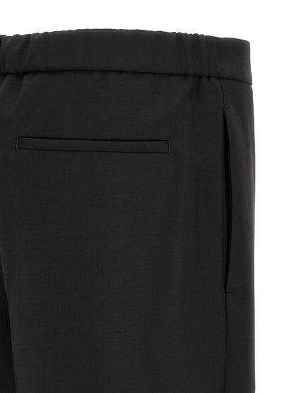 Trousers by Jil Sander for men in mohair & virgin wool black features a artisanal silhouette, showcasing a sophisticated cropped with a cropped and for a artisanal finish.