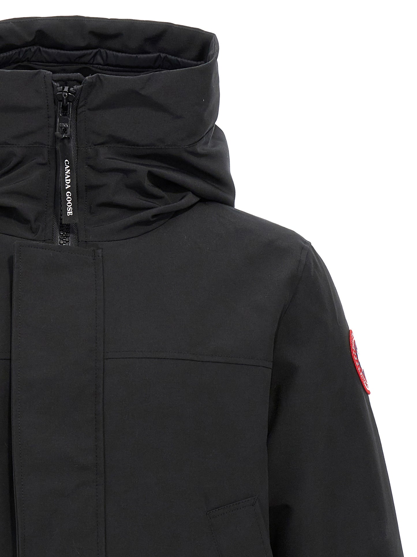 This Parka by Canada Goose for men in polyester goose-down & cotton black presents a utilitarian silhouette, meticulously detailed with windproof, hooded & insulated and a utilitarian hooded high-collar neckline for a sophisticated, weather-ready look.