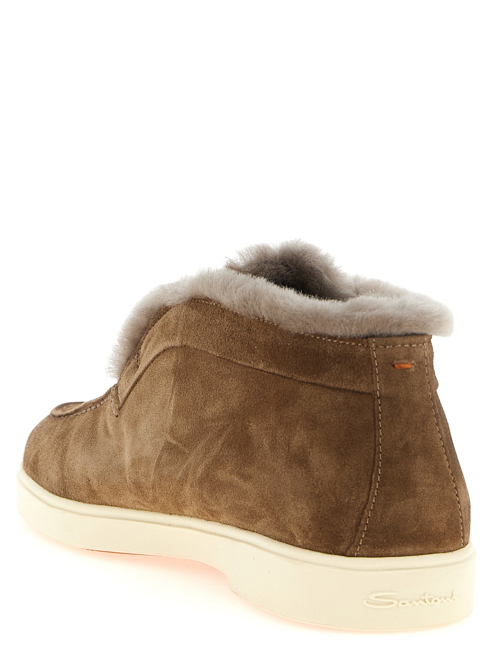 Flat Ankle Winter Boots by Santoni for women in suede calfskin leather & lamb shearling brown showcases a impeccable silhouette as Women's Suede Calfskin Leather & Lamb Shearling Flat Ankle Winter Boots, artfully defined by a impeccable flat and a impeccable .