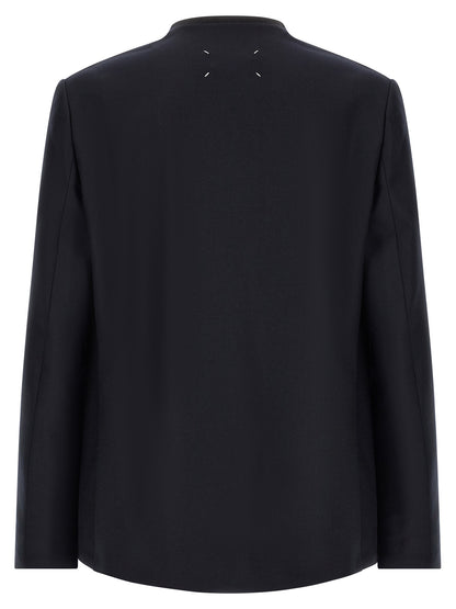 Blazer by Maison Margiela for men in flannel & virgin wool navy & signature presents a distinguished silhouette, detailed with a distinguished v-neck lapel neckline and distinctive for a truly sophisticated finish.