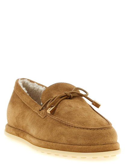 Flat Moccasin Moccasins Loafer Slip-On Shoes by Tod's for women in suede calfskin leather beige & signature features an ergonomic silhouette, perfectly showcasing Women's Suede Calfskin Leather Flat Moccasin Moccasins Loafer Slip-On Shoes with its distinct flat and elegant .