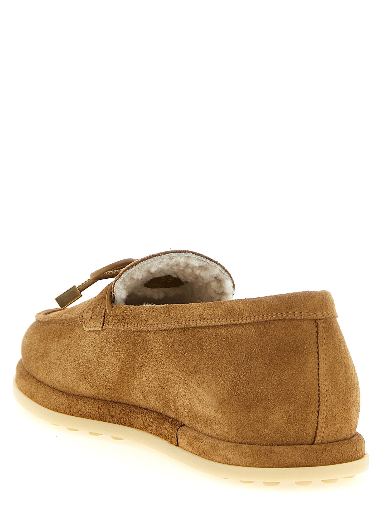 Flat Moccasin Moccasins Loafer Slip-On Shoes by Tod's for women in suede calfskin leather beige & signature showcases a timeless silhouette from the Women's Suede Calfskin Leather Flat Moccasin Moccasins Loafer Slip-On Shoes collection, featuring a timeless flat and for a timeless finish.