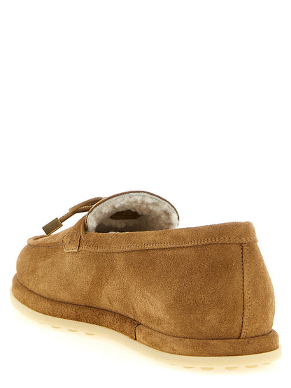 Flat Moccasin Moccasins Loafer Slip-On Shoes by Tod's for women in suede calfskin leather beige & signature showcases a timeless silhouette from the Women's Suede Calfskin Leather Flat Moccasin Moccasins Loafer Slip-On Shoes collection, featuring a timeless flat and for a timeless finish.