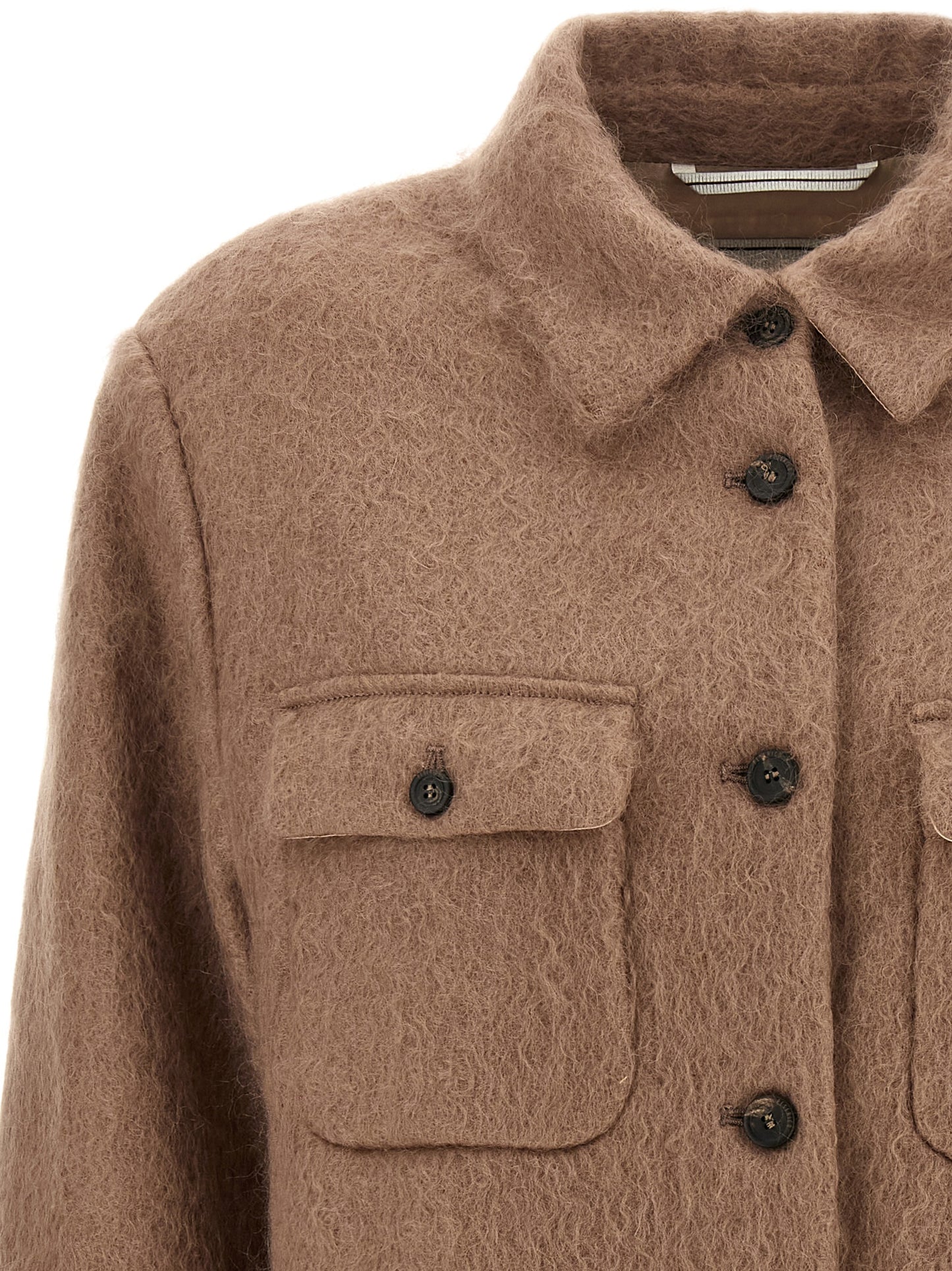 This Jacket by Peserico for women in cotton mohair & virgin wool beige & hazelnut showcases a magnificent silhouette, meticulously crafted with a distinctive and functional pockets for a magnificent finish.