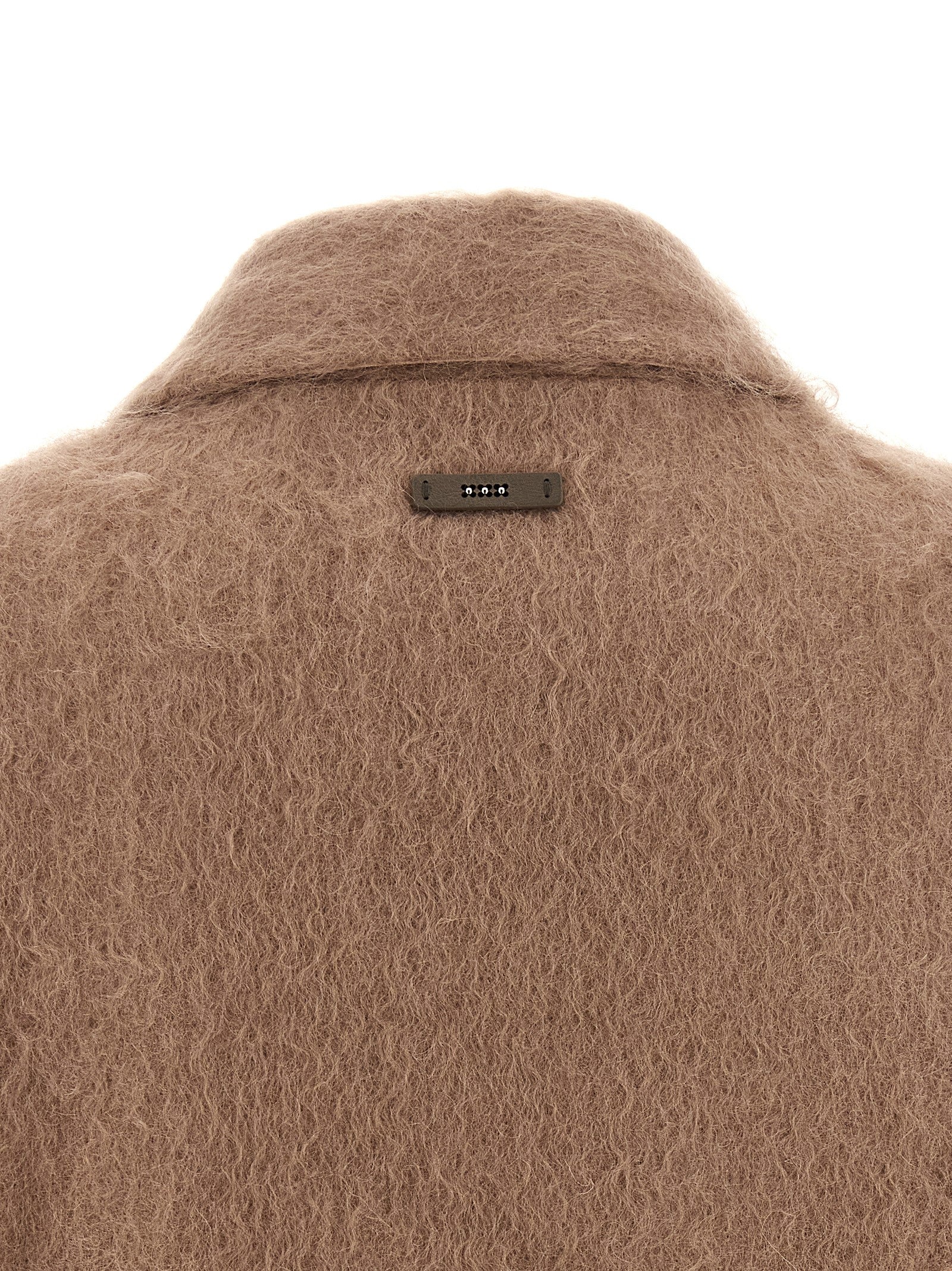 Jacket by Peserico for women in cotton mohair & virgin wool beige & hazelnut showcases a enveloping silhouette, artfully detailed with a enveloping and premium pockets for a truly enveloping finish.