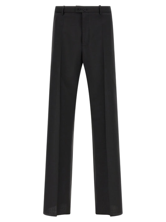 Trousers by Jil Sander for men in mohair virgin wool black features a tailored silhouette with a tailored straight-leg, defined by its long and a sophisticated .