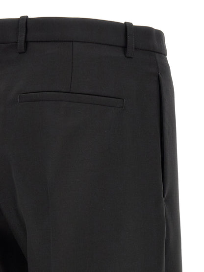 Trousers by Jil Sander for men in mohair virgin wool black presents a smart silhouette, meticulously detailed with a smart straight-leg, a smart long, and a smart .