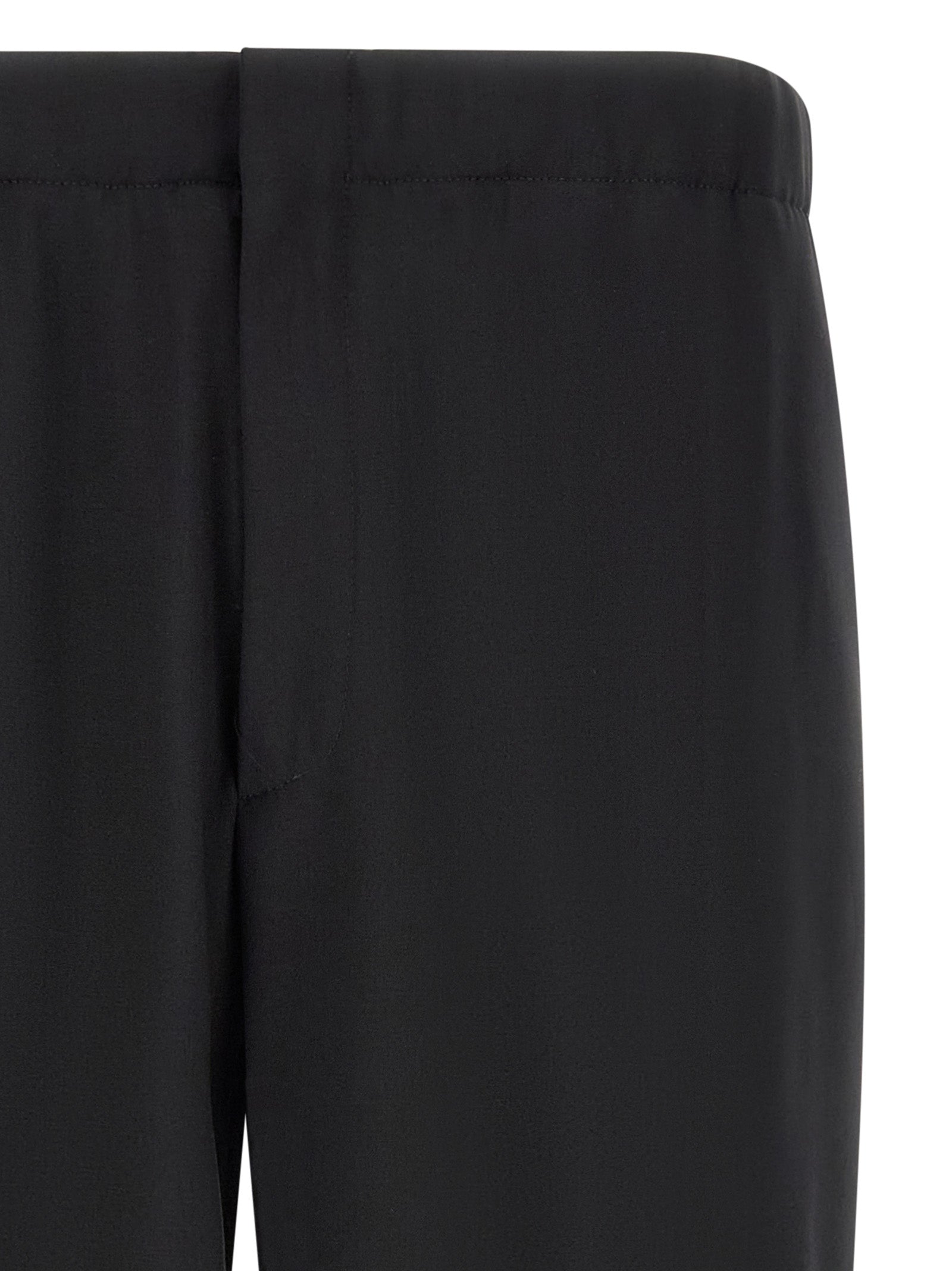 Trousers by Lardini for men in virgin wool black features a tailored silhouette with a tailored straight-leg, defined by its long and a sophisticated .