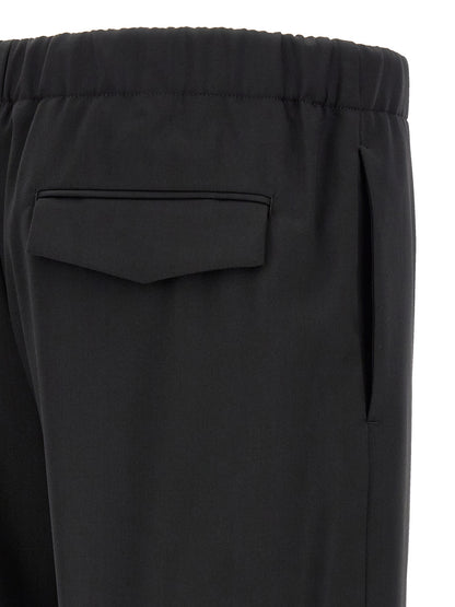 Trousers by Lardini for men in virgin wool black features a artisanal silhouette, showcasing a sophisticated straight-leg with a long and for a artisanal finish.