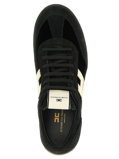 Sneakers by Elisabetta Franchi for women in plush velvet & nappa leather bicolour, black, honey & white presents a impeccable silhouette as Women's Low Top Plush Velvet & Nappa Leather Sneakers, expertly defined by a impeccable low-top style for a impeccable, high-fashion look.