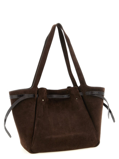 Tote Bag by Tory Burch for women in bos taurus suede cowhide leather brown, gold & print features an metropolitan chic Romy Bos Taurus Suede Cowhide Leather Tote Bag design with a secure zipper & button, metropolitan chic , and versatile for a metropolitan chic look.