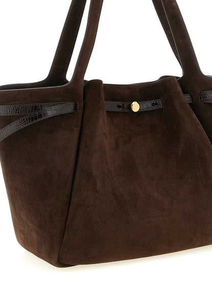 This Tote Bag by Tory Burch for women in bos taurus suede cowhide leather brown, gold & print features an on trend Romy Bos Taurus Suede Cowhide Leather Tote Bag design with a secure zipper & button, ample , and on trend .