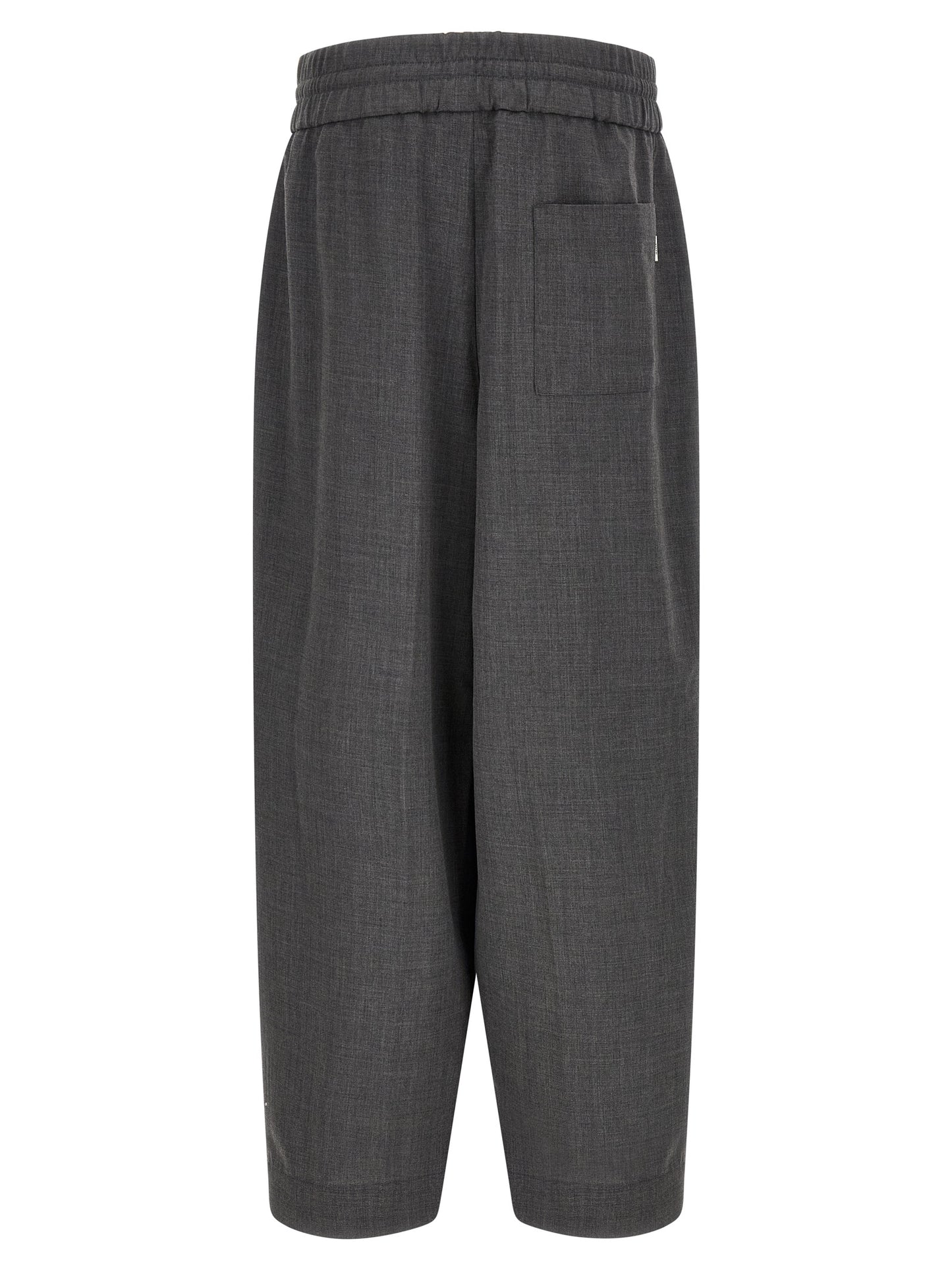 Trousers by Ami Paris for men in virgin wool gray & signature features a sculptural silhouette, showcasing a sculptural relaxed-fit and long with a sophisticated high rise for a sculptural finish.