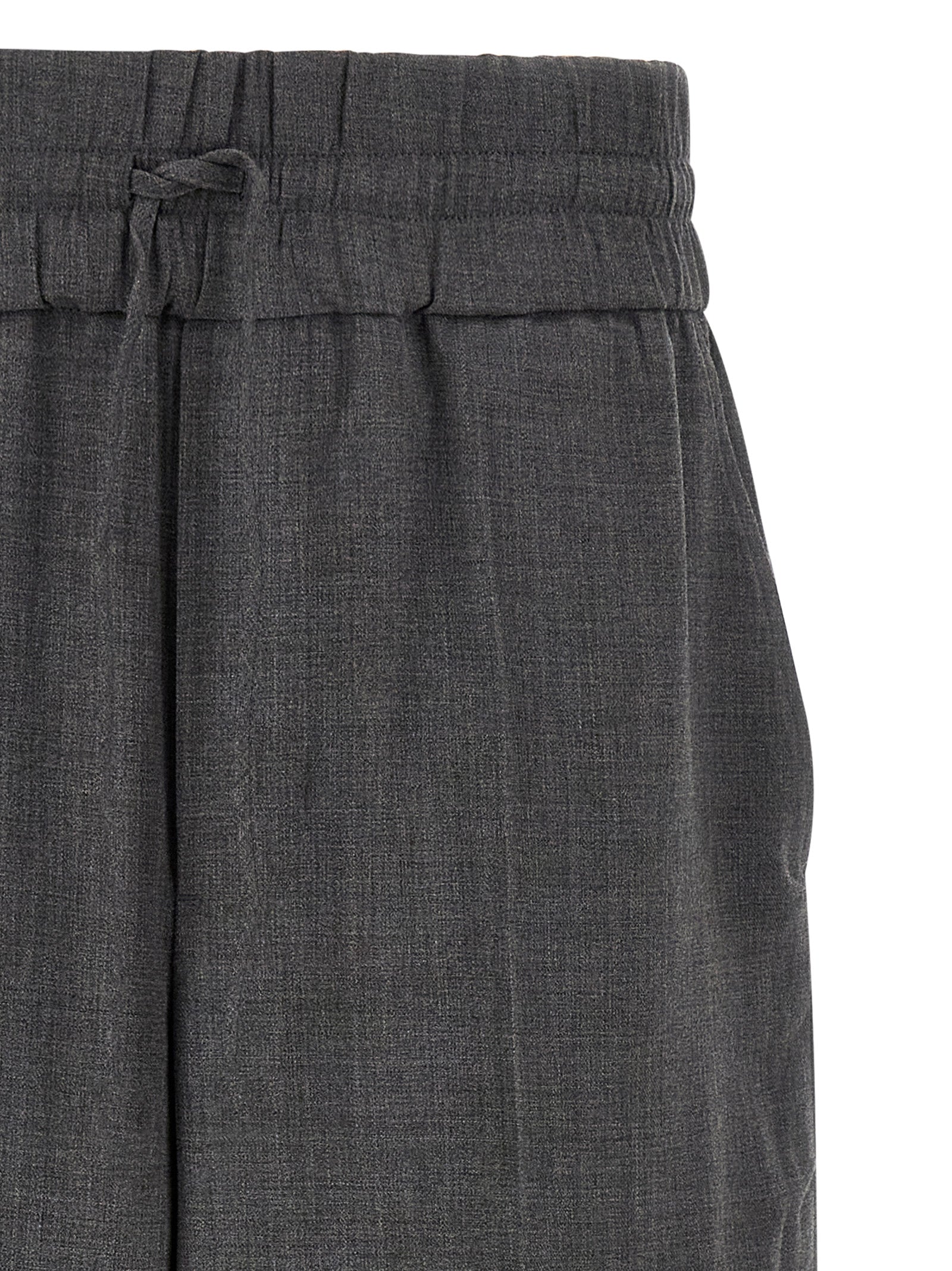 Trousers by Ami Paris for men in virgin wool gray & signature features a tailored silhouette with a tailored relaxed-fit, defined by its long and a sophisticated high rise.