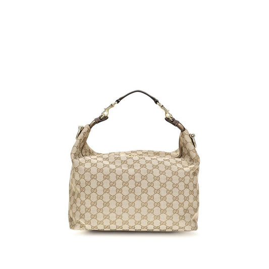 Medium Shoulder Bag by Gucci for men in nylon leather & canvas beige & gold features an effortlessly chic silhouette with a secure zipper, ample , and versatile shoulder-strap, adjustable-strap, detachable-strap & handle for effortlessly chic everyday luxury.