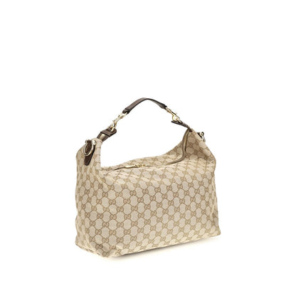 Medium Shoulder Bag by Gucci for men in nylon leather & canvas beige & gold features a enviable silhouette, showcasing a secure zipper, ample , and enviable shoulder-strap, adjustable-strap, detachable-strap & handle for a enviable finish.