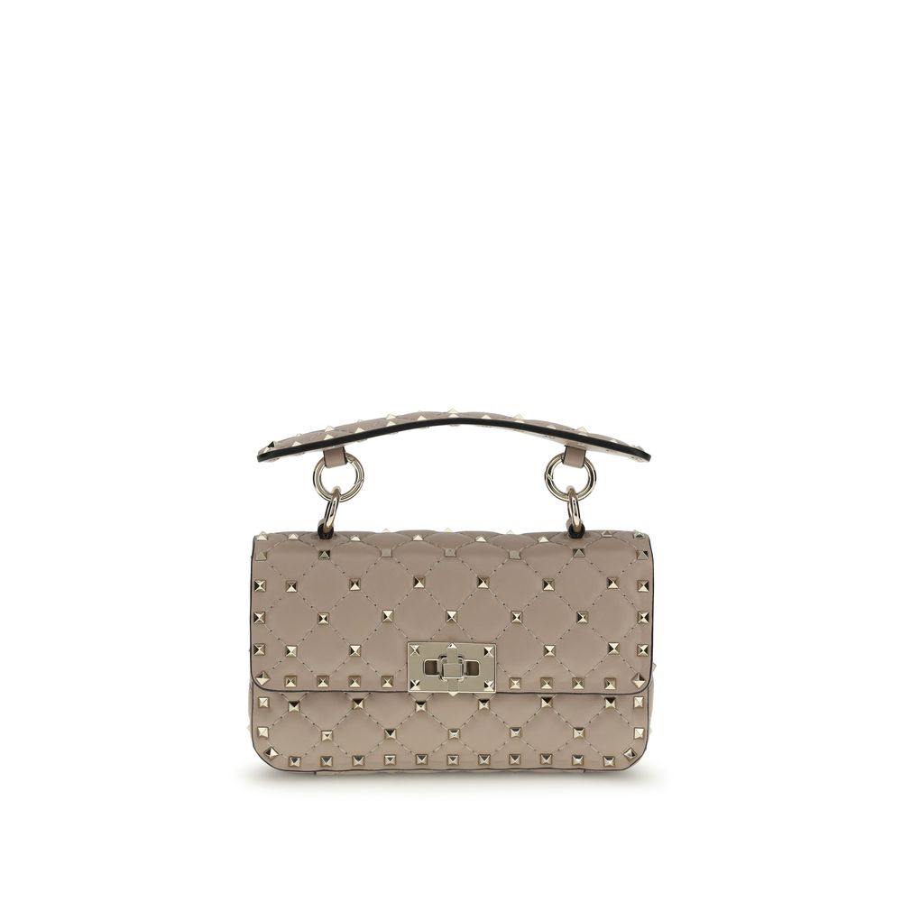 Small Shoulder Handbag by Valentino Garavani for women in bos taurus calf leather pink features an refined silhouette, showcasing a secure , ample , and versatile shoulder-strap for a sophisticated refined aesthetic.