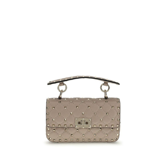 Small Shoulder Handbag by Valentino Garavani for women in bos taurus calf leather pink features an refined silhouette, showcasing a secure , ample , and versatile shoulder-strap for a sophisticated refined aesthetic.