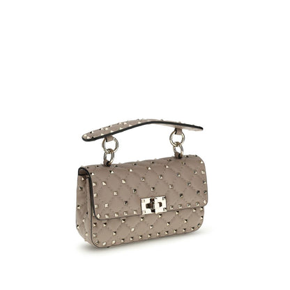 Small Shoulder Handbag by Valentino Garavani for women in bos taurus calf leather pink presents a ornamental silhouette, showcasing a secure , ample , and versatile shoulder-strap for a ornamental finish.