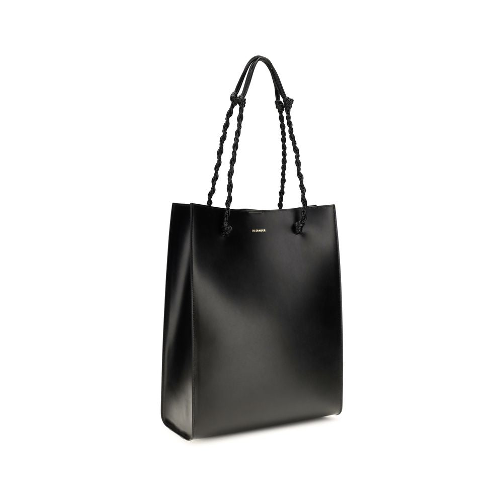 Shoulder Shopper Bag by Jil Sander for women in bos taurus calf leather black features a distinguished silhouette, showcasing a secure and distinguished with versatile shoulder-strap for a distinguished finish.
