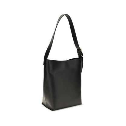 This Tote Handbag by Jil Sander for women in bos taurus calf leather and black presents a sculptural silhouette featuring a secure , ample , and versatile for a sculptural finish.