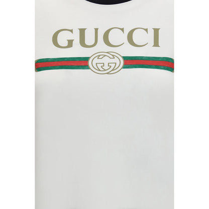 T-Shirt by Gucci for women in cotton white & print showcases a fashionable silhouette, elegantly detailed with a fashionable and for a sophisticated, high-fashion look.