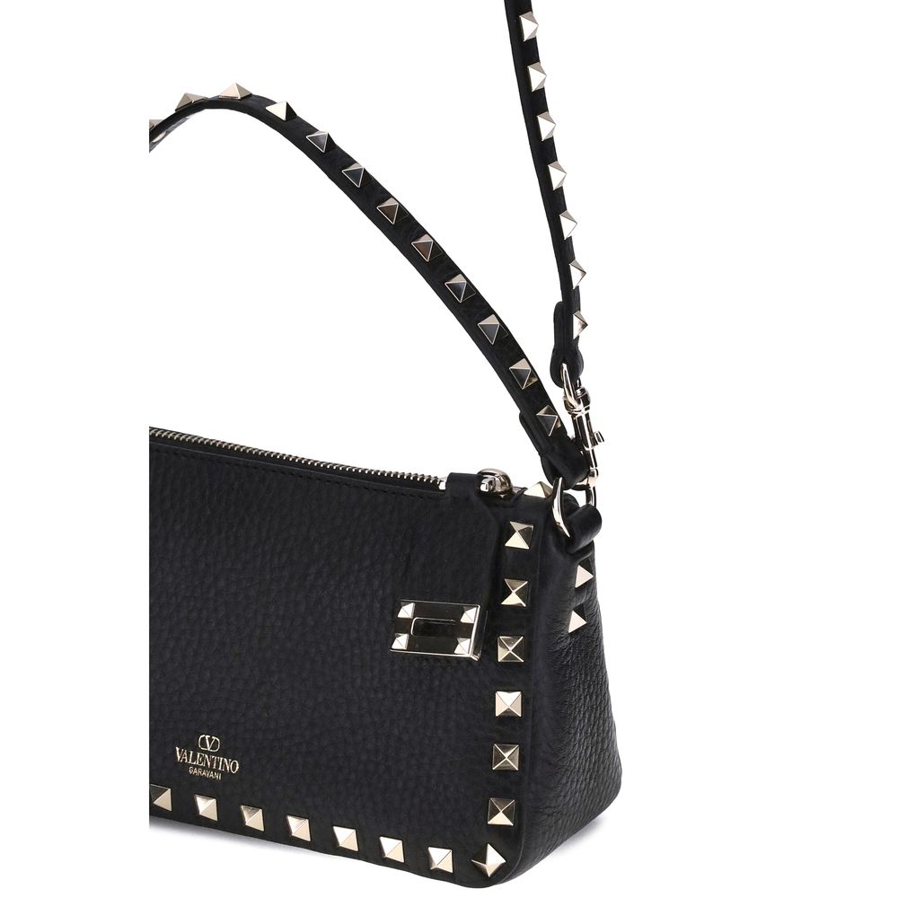 Shoulder Bag by Valentino Garavani for women in bos taurus calfskin leather black & signature features an effortlessly chic silhouette with a secure zipper & hook, ample cardholder, and versatile shoulder-strap, adjustable-strap & detachable-strap for effortlessly chic everyday luxury.