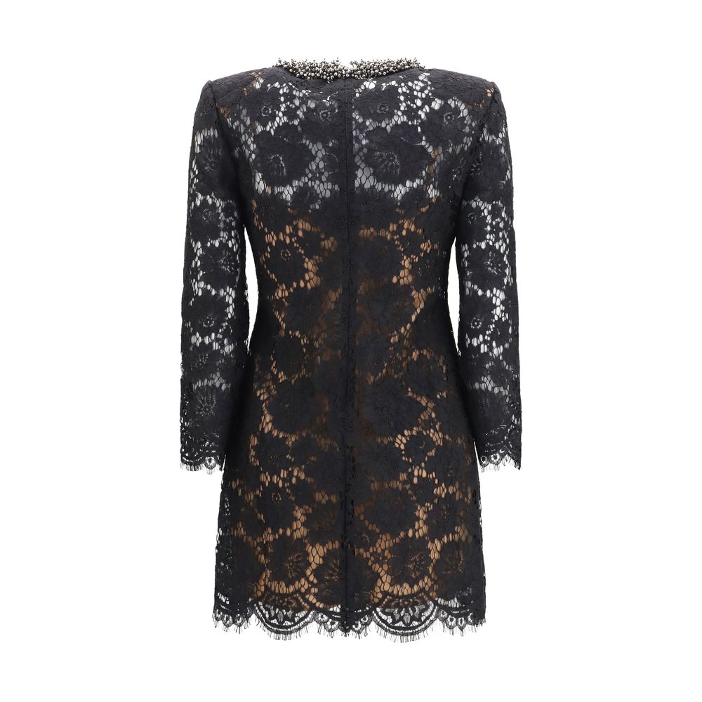 Dress by Self-Portrait for women in polyamide viscose & cotton black presents a sinuous silhouette, showcasing a sophisticated crew neckline and detailed with a sinuous short mini for a refined finish.