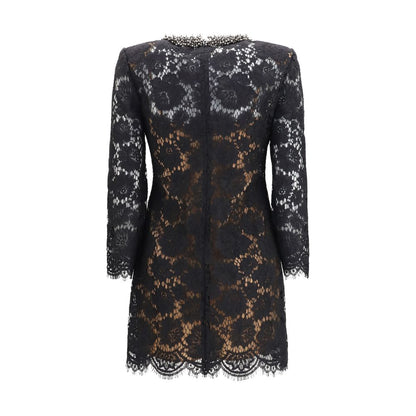 Dress by Self-Portrait for women in polyamide viscose & cotton black presents a sinuous silhouette, showcasing a sophisticated crew neckline and detailed with a sinuous short mini for a refined finish.